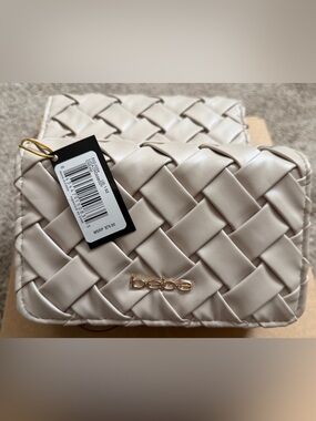 bebe Cream Woven Clutch with Gold Logo